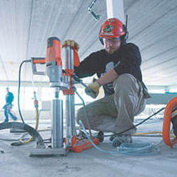 What is the scope of concrete coring in construction?